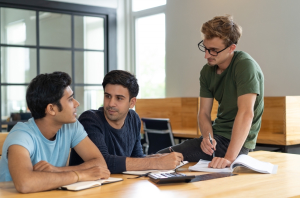 Students learning business and management skills during BBA course